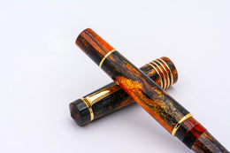 Delta DV Original Mid-Size Fountain Pen - Glow Up ORO